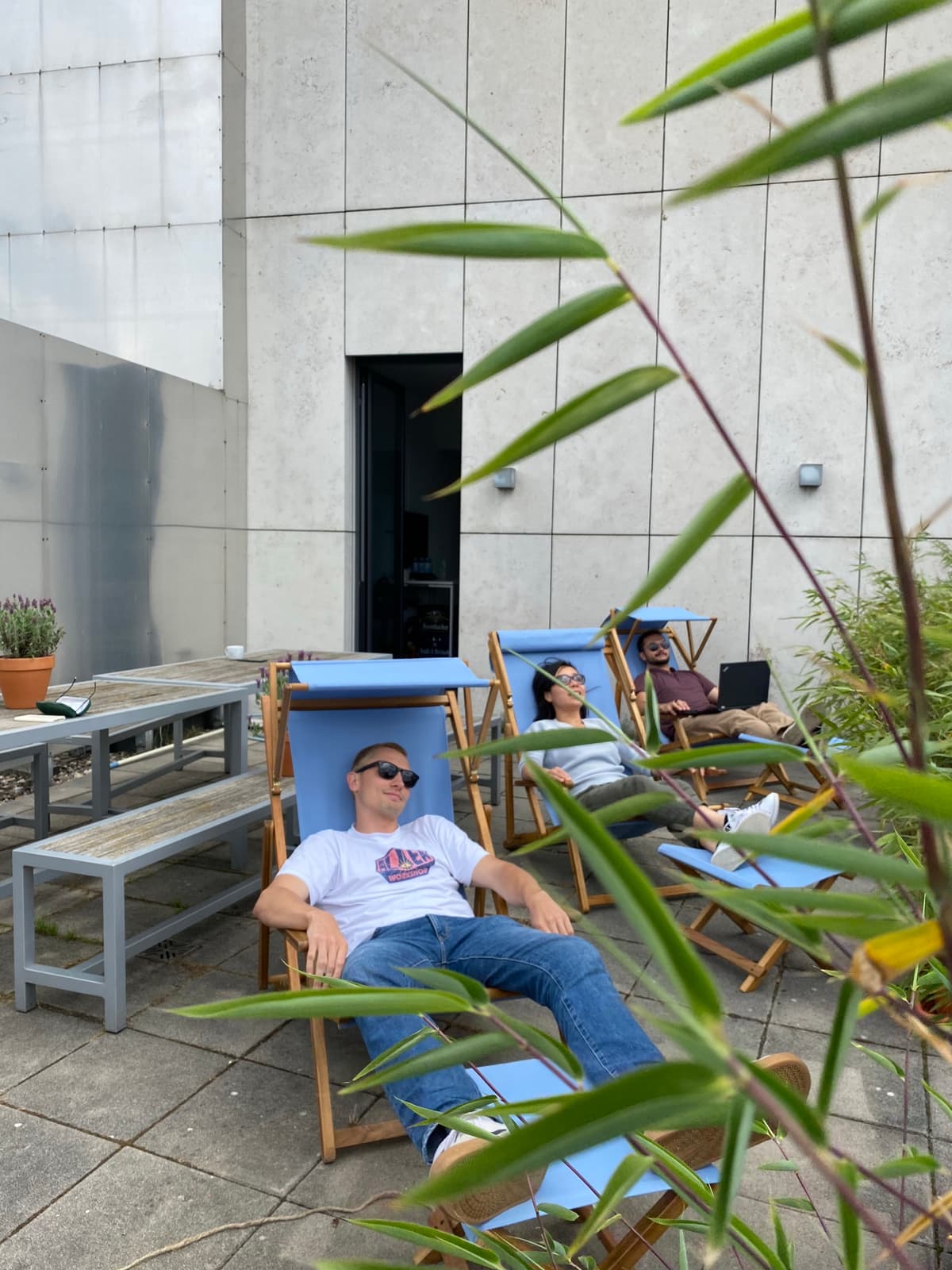 Relaxing on the office balcony in a comfortable chair